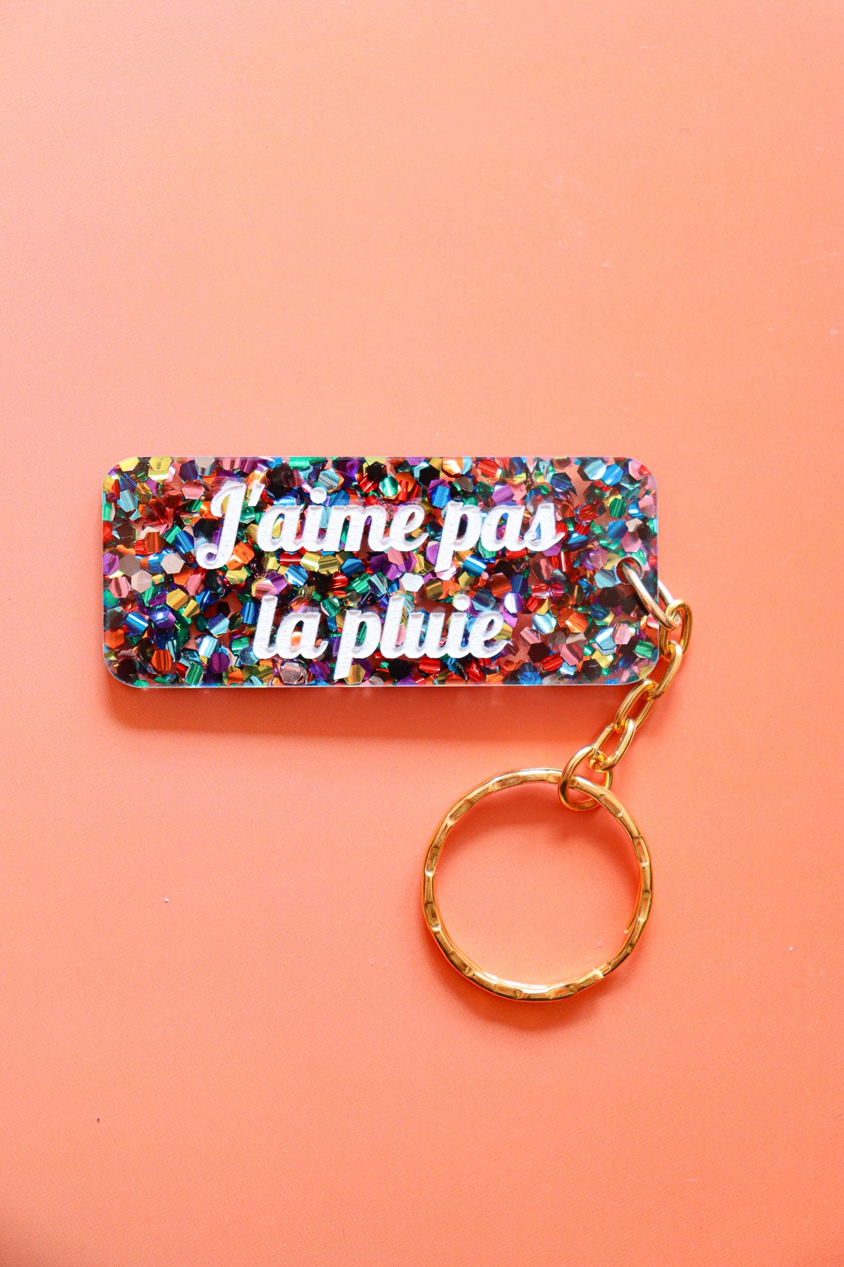 Porte clés à message - J'aime pas la pluie