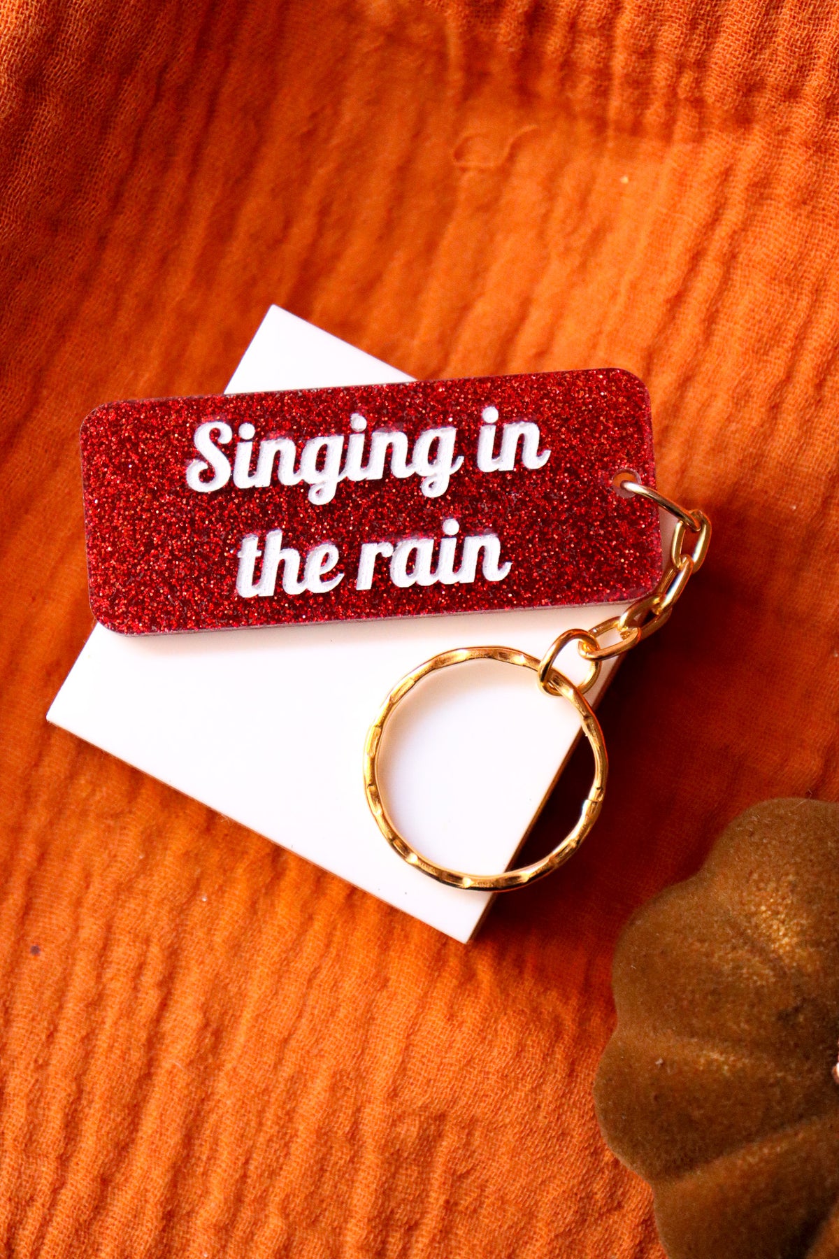 Porte clés à message - Singing in the rain